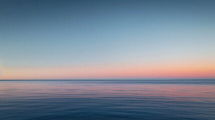 Obraz premium Serene Ocean Horizon at Sunset with Gentle Ripples.