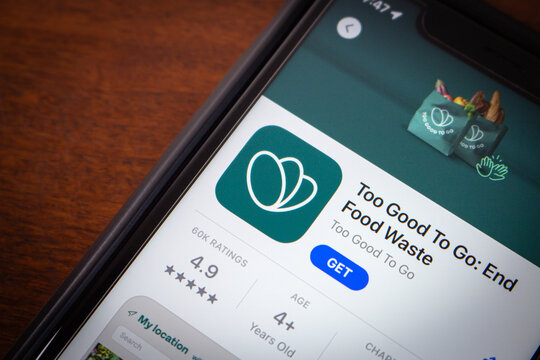 Vancouver, CANADA - May 14 2024 : Too Good To Go, a mobile application that connects customers to restaurants and stores that have surplus unsold food, seen in an App Store on an iPhone.