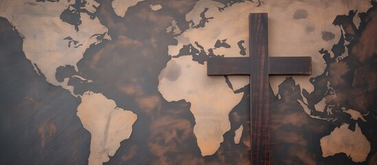 Holy cross of Jesus Christ and world map. Global mission and evangelism concept. The holy cross laying on the world map. Spreading a word about God to all nations.