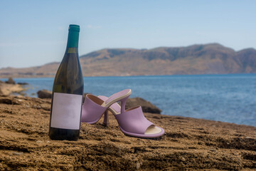 Bottle of wine by the sea