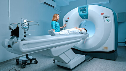 Radiologist consults patient before undergoing diagnostics using magnetic resonance imaging machine...