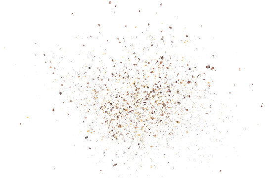 Black ground pepper scattered, spice flying isolated on white, clipping path	
