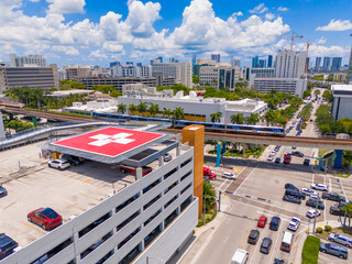 Helipad. Helicopter landing pad at a hospital. Aerial photo red H cross symbol. Medical center © Felix Mizioznikov