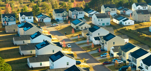 Aerial view of tightly located new family houses in South Carolina suburban area. Real estate development in american suburbs