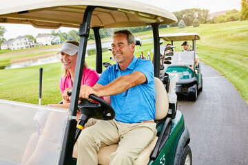 People, golf cart and smile on field or driving, happy and relax in transport path for country club hobby on weekend break. Fitness, couple and outside sport on course for game, golfers and together