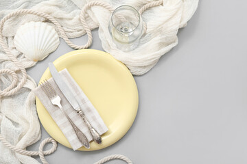 Beautiful table serving with marine decor on white background