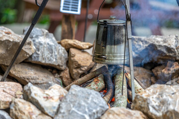 The background of the park decoration has a corner and wooden chairs for sitting and relaxing during the day. Amidst a grove of flowers