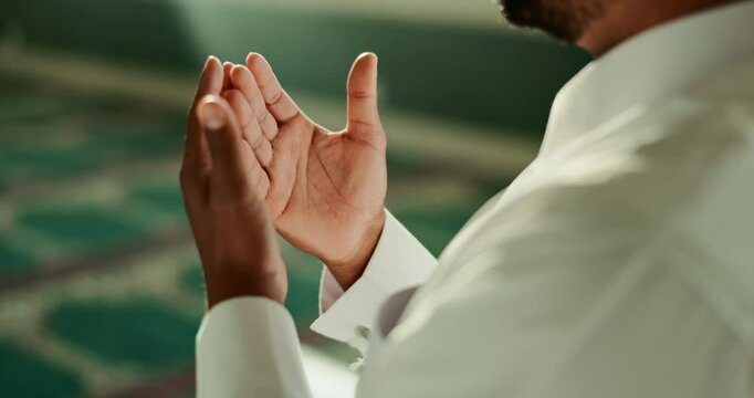 Islamic, man and open hands in Mosque for peace, gratitude or Palestine support in holy temple to Allah. Closeup, spritual and Muslim Imam praying to worship God on Ramadan Kareem in Saudi Arabia