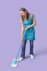 Pretty woman mopping floor on purple background