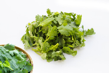 Fototapeta premium Fresh organic coriander, vegetables and herbs