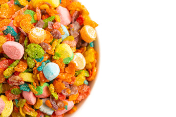 Bowl of Rainbow Colored Fruity Flavored Marshmallow Kids Cereal Isolated on a White Background.