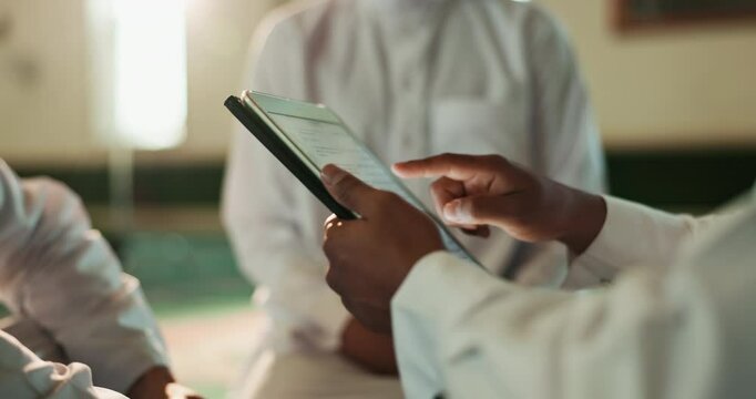 Hands, tablet and teaching with Muslim people reading Quran online together in Mosque for faith. Belief, religion or scripture and students learning with Mullah for Islamic culture or tradition