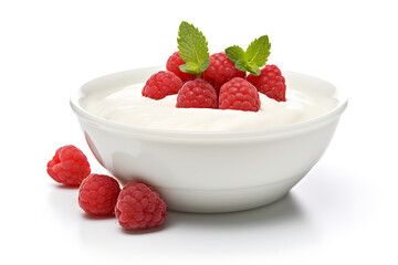 bowl of yogurt with fresh raspberries and blueberries isolated on white background