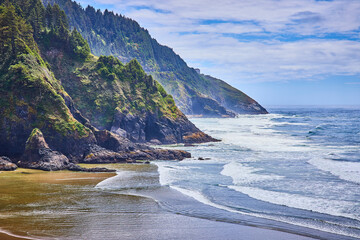Rugged Oregon Coastline with Cliffs and Crashing Waves from Mid-Level View