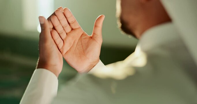 Muslim, man and open hands in Mosque for dua, gratitude or Palestine support in holy temple for Allah. Closeup, spritual and Islamic Imam praying to worship God on Ramadan Kareem in Saudi Arabia