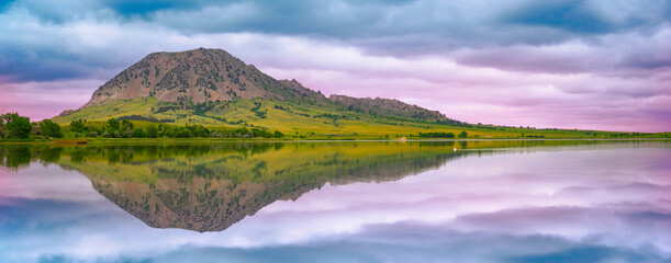 Bear Butte, or Paha Sapa in Lakota language for Black Hills, reflected on the Bear Butte Lake in...