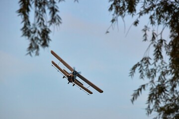 Old propeller plane in the sky
