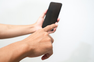 Man's hand holding a smart phone screen view from above. isolated in white background