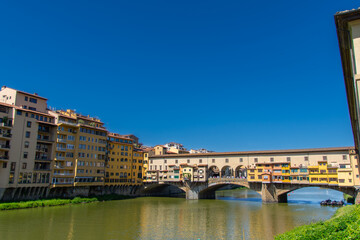 Naklejka premium View of the famous Ponte Vecchio over the Arno river in the city of Florence in Italy.