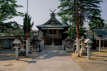 a View of Building of Sannomiyainari Shrine in Maizuru, Kyoto, Japan. Surrounded by Trees and...