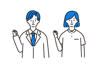 ガッツポーズをする医療従事者の男女