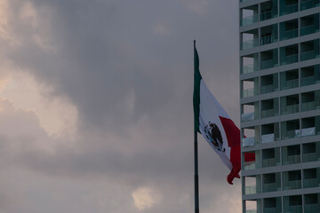 flag of mexico on the sky, flag of mexico on the sky, flag of mexico on a cloudy day