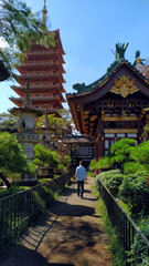 Person walking in the garden of Minh Thanh pagoda, Pleiku, Gia Lai, VIetnam 