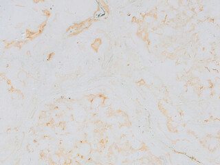 Dolomite texture. Natural rock with beautiful beige patterns on the surface. Polished flat stone. Classic luxury decoration building material. Solid stone background.