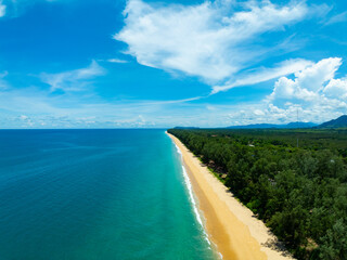 Aerial view sandy beach and waves crashing on sandy shore, Beautiful tropical sea surface background