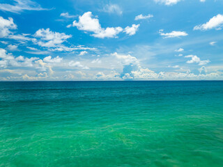 Aerial view of amazing sea surface water texture background,Sun reflections over ocean, Aerial flying drone view Waves water surface texture on sunny tropical ocean in Phuket island Thailand