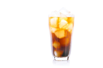 a glass of iced coffee on a white table