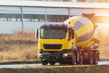 Cement Mixer Truck Delivers Concrete to Build the Foundation of a New Structure;