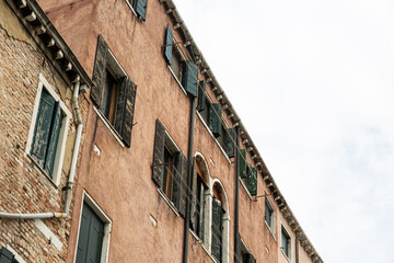 View to typical house in Venice with windows with shutters