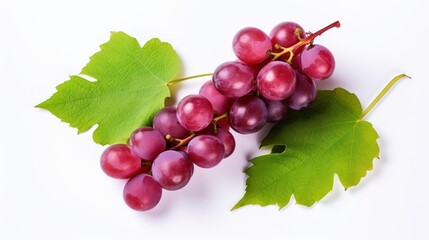 Fototapeta premium Red grapes with green leaves and half sliced on white background. 