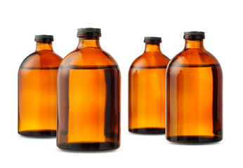 Four Amber Glass Bottles With Black Caps on a White Background