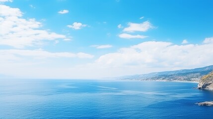 Fototapeta premium Infinite azure expanse panoramic sea and sky with endless white clouds stretching to the horizon