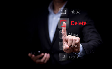 The programmer's hand is tapping on the file icon under the concept of data deletion. The concept  technology and document management.data deletion and removal