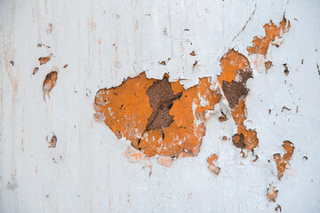 background,Saffron plastered brick wall texture. Saffron painted retro wall built structure. Grungy shabby uneven painted plaster. Abstract saffron wash background. Design element.
