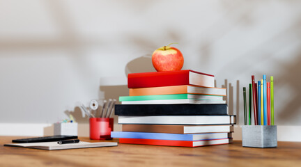 Stack of books and school supplies. Education and back to school theme