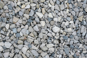 Grey gravel background, used for driveways and courtyards