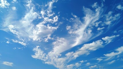 Fototapeta premium Partially sunny with wispy white clouds