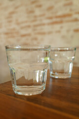 Close up glass of iced spring water