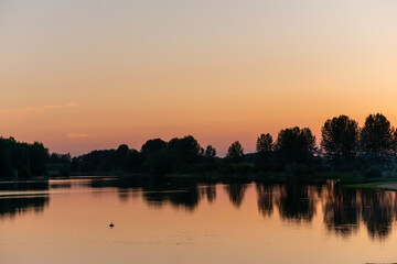 calm water on the river on a beautiful evening at sunset calm and zen