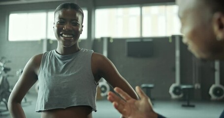 Woman, fist bump and coach for fitness at gym, sports goals and workout motivation of exercise progress. Excited, athlete and man for support, performance and teamwork of training for health wellness
