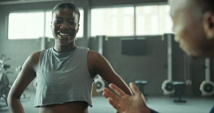 Woman, fist bump and coach for fitness at gym, sports goals and workout motivation of exercise progress. Excited, athlete and man for support, performance and teamwork of training for health wellness