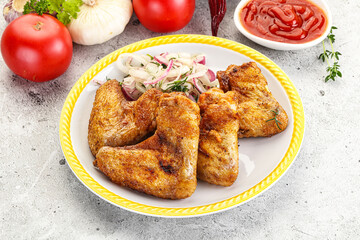 Grilled chicken wings with sauce