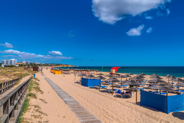 Obraz premium Wooden beach path access route Alvor Portugal beach southern Algarve between Portimao and Lagos