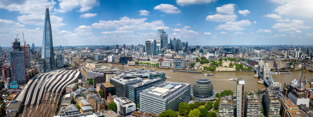 Beautiful panoramic aerial summer view of the skyline of London, England, from London Bridge along the Thames to the Tower