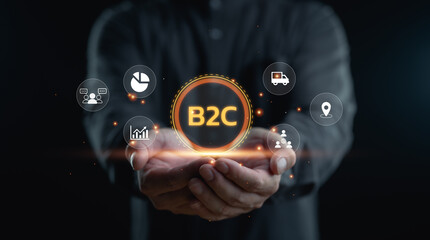 B2C concept, business to customer concept, Business person hands show B2C business to customer icon on virtual screen. marketing strategy cooperation communication finance concept.