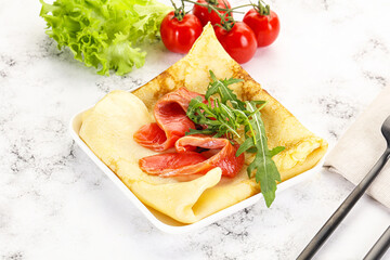 Russian pancake with salmon fish